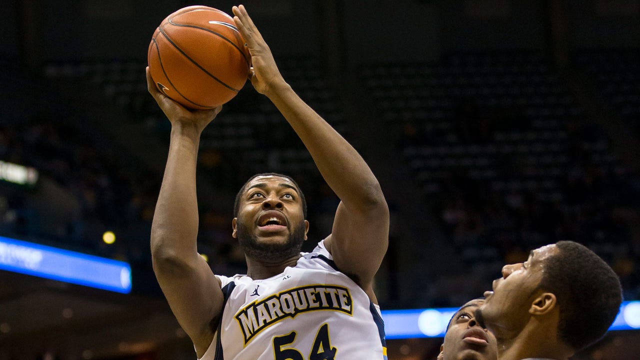 Gardner digs deep, leads Marquette to narrow win over Georgetown